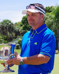 Joe Alfieri holds his championship trophy after winning the FSGA Mid-Amateur Sunday at Vero Beach CC.  Photo by Bill Van Smith..JPG